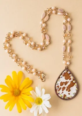 Tan White Cow print teardrop pendant with crystal beaded necklace